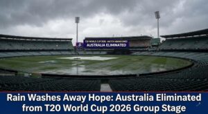 Ground staff covering the pitch at Pallekele International Stadium during heavy rain.