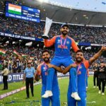 ndian cricket team celebrating with the T20 World Cup 2026 trophy at Narendra Modi Stadium.