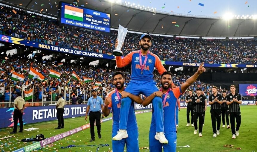 ndian cricket team celebrating with the T20 World Cup 2026 trophy at Narendra Modi Stadium.