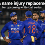Indian cricket team players huddling together on the field in their blue limited-overs kits.