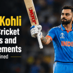 Virat Kohli celebrating an ODI century with his bat and helmet raised in the air.